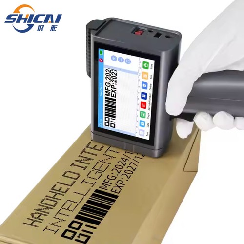 Handheld inkjet printer prints