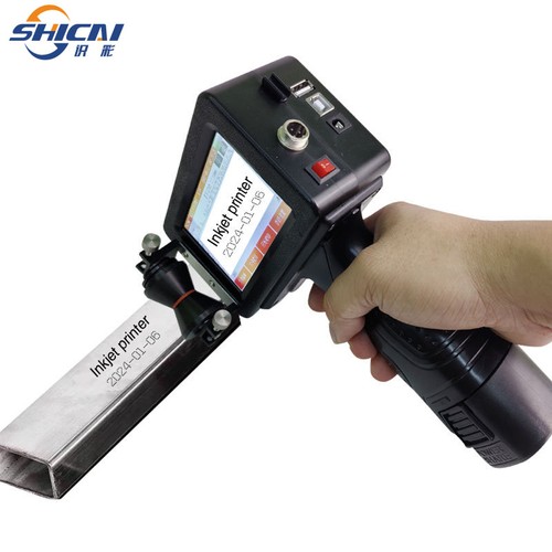 Handheld inkjet printer - , prints