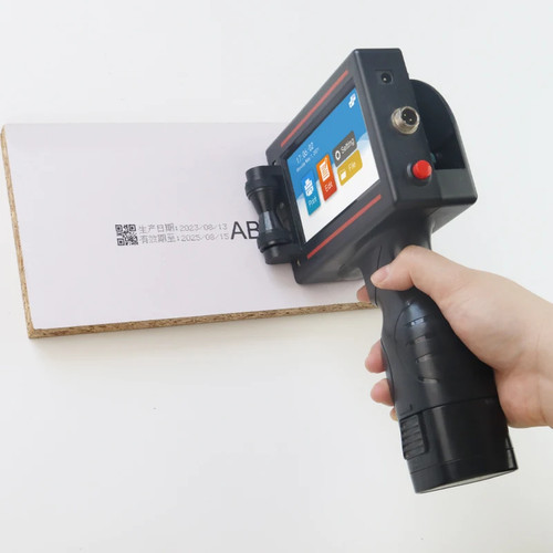 Handheld inkjet printer prints