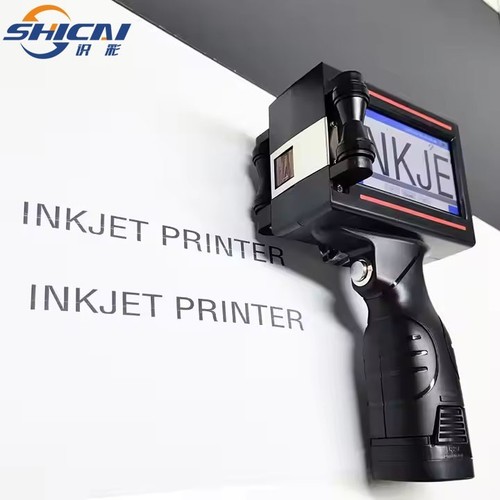 Handheld inkjet printer prints